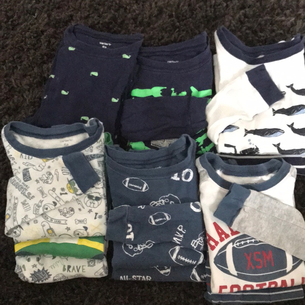 Lot of Carters boys pajamas.